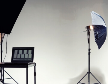 photo studio setup with lights and chair